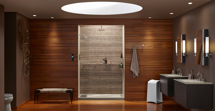 This bathroom design by Kohler Co. shows how natural materials, sleek fixtures and a well-equipped shower stall can transform a bathroom into a spa-like setting.)